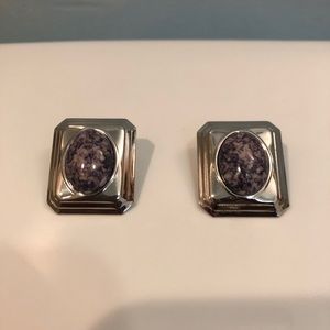 Silver earrings with purple stone